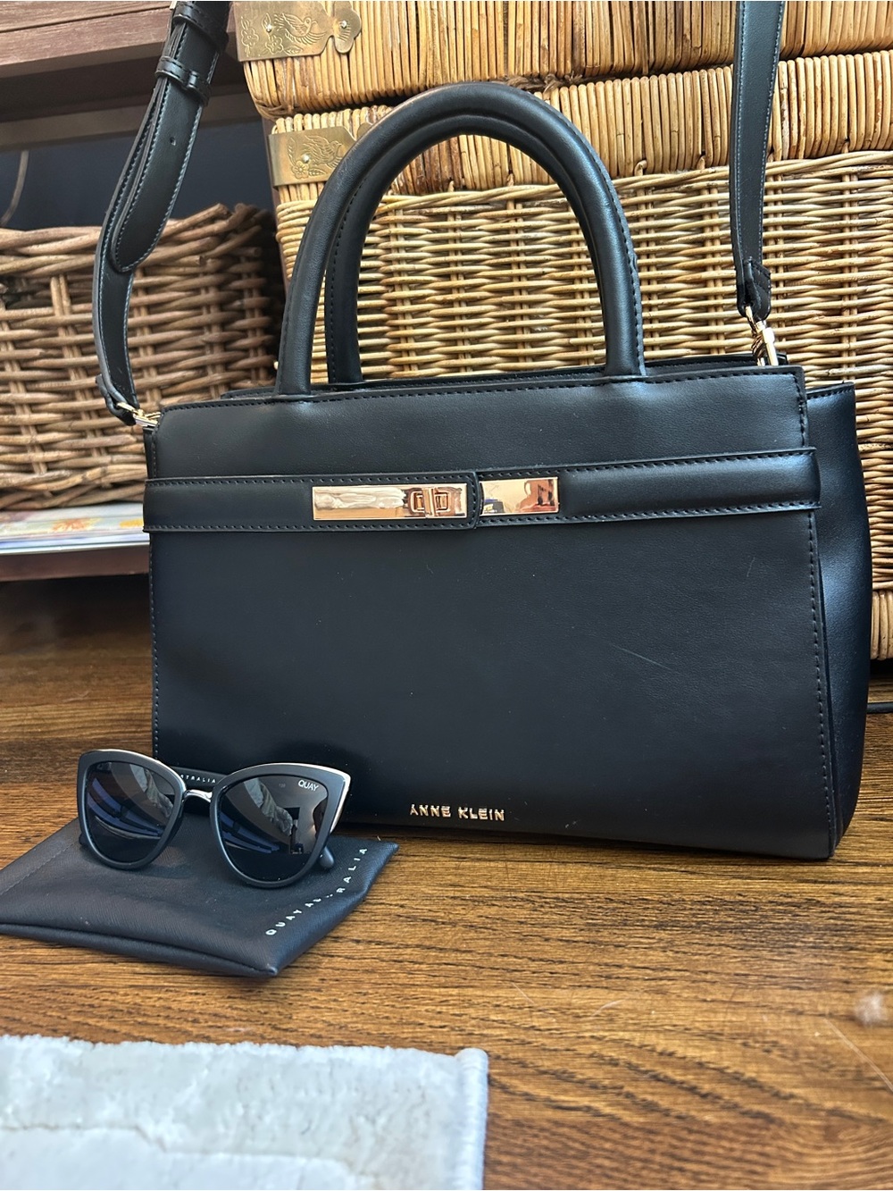 Black Quay cat eye sunglasses with Anne Klein Black Leather Satchel